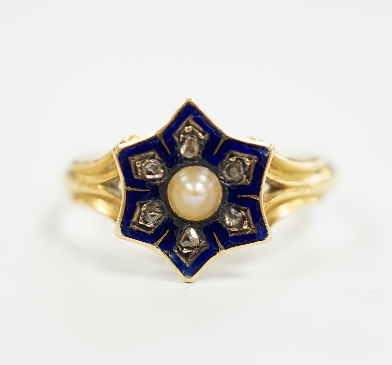 A Victorian 18ct gold, enamel, rose cut diamonds and split pearl set ring, size L, gross weight 2.9 grams.
